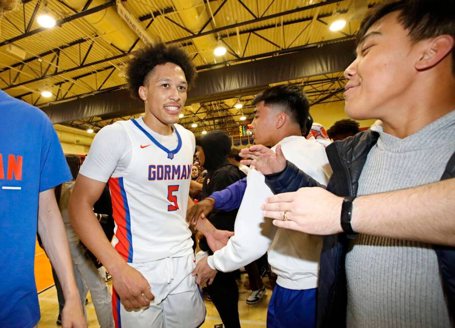 Bishop Gorman High School's Darrion Williams (5) celebrates after their victory against Liberty ...