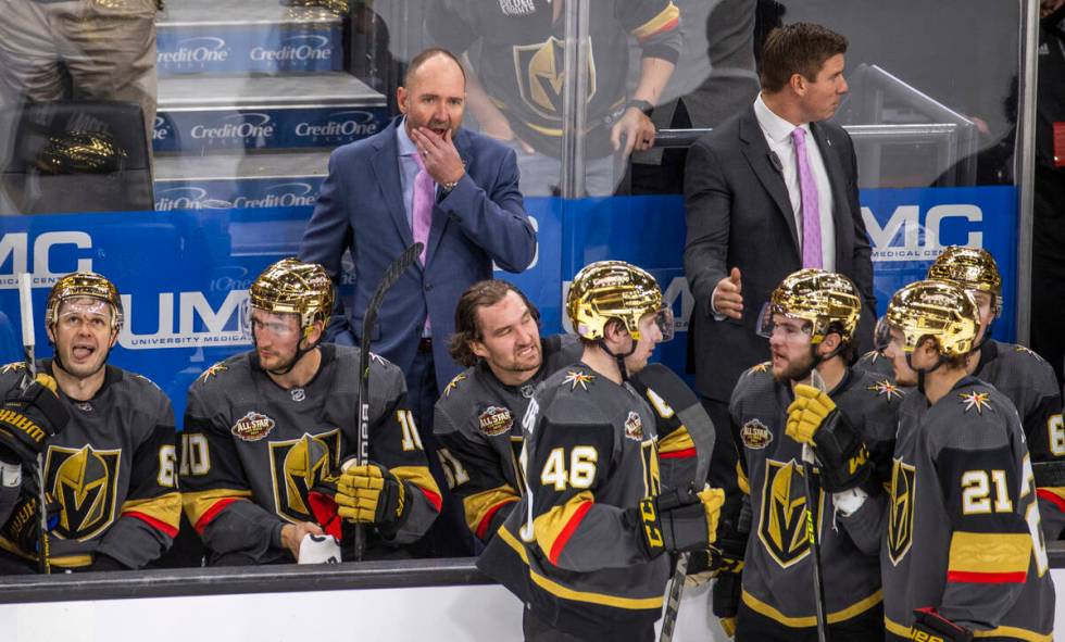 Golden Knights head coach Pete DeBoer waits to see if their third goal is counted versus the Co ...