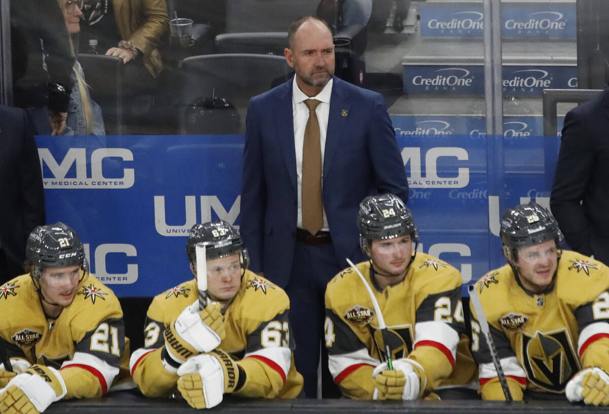 Golden Knights head coach Pete DeBoer watch his players during the third period of an NHL hocke ...