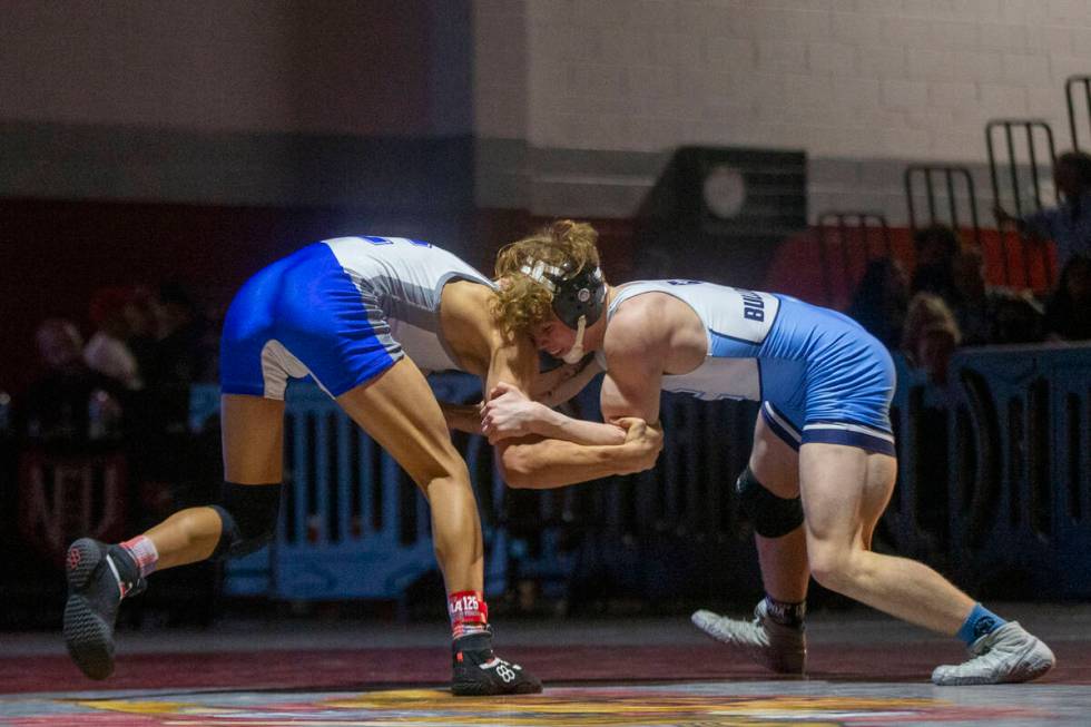 Centennial High School’s Dylann Ciarciaglini, left, wrestles Carson High School’s ...