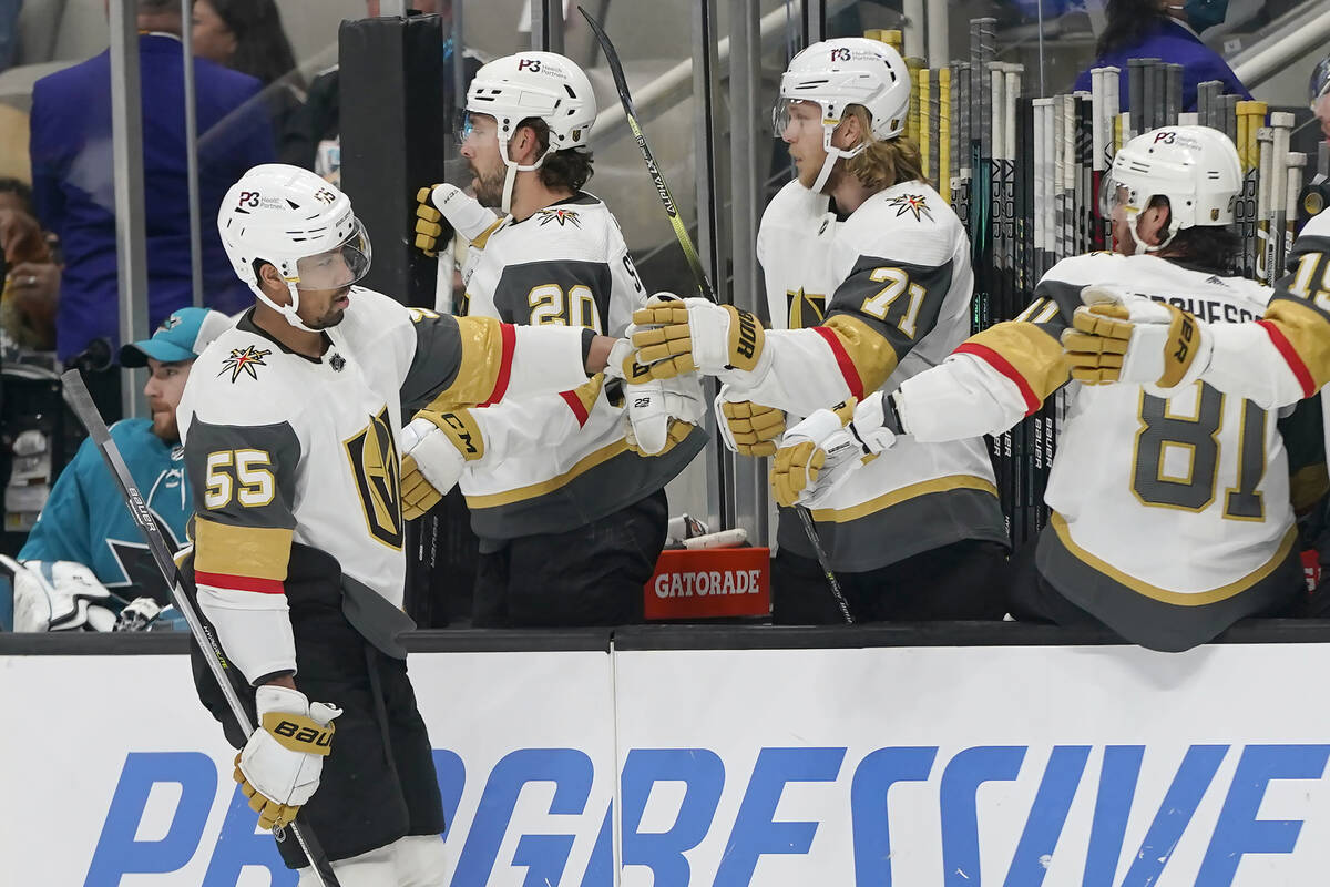 Vegas Golden Knights right wing Keegan Kolesar (55) is congratulated by teammates after scoring ...