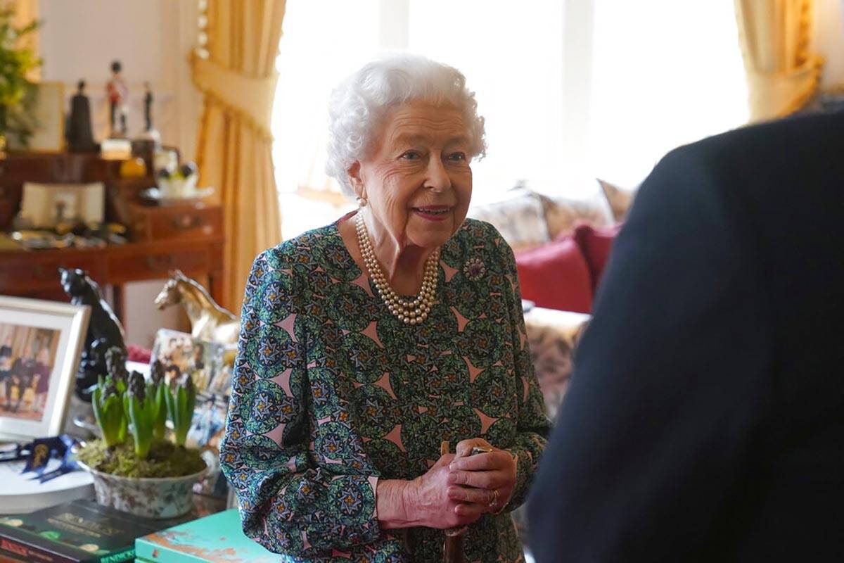 FILE - Queen Elizabeth II speaks during an audience at Windsor Castle where she met the incomin ...