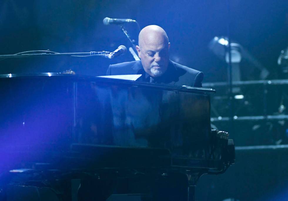 Musician Billy Joel performs during his 100th lifetime performance at Madison Square Garden on ...