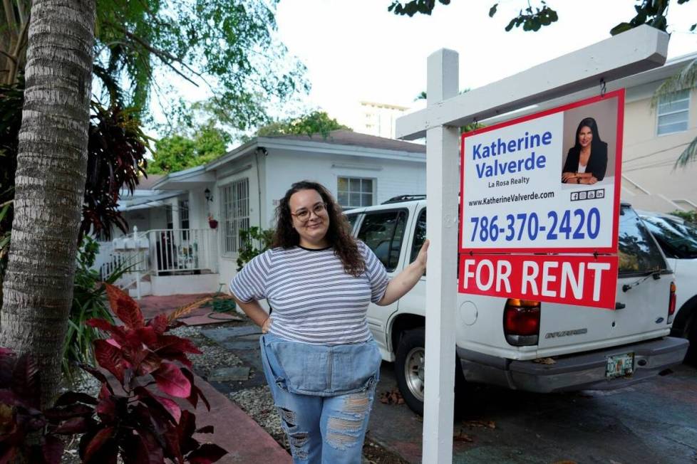 Krystal Guerra, 32, poses for a picture outside her apartment, which she has to leave after her ...