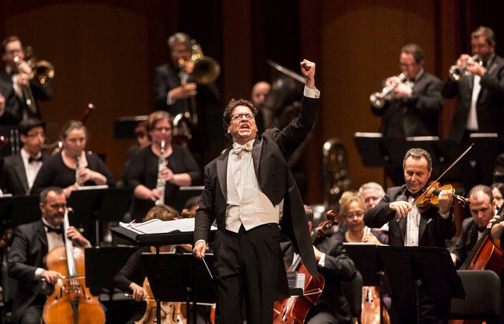 Music Director Donato Cabrera salutes the audience before the start of a performance by the Las ...