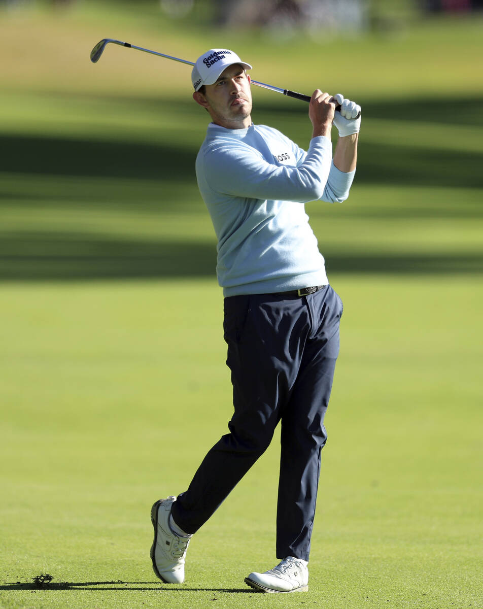 Patrick Cantlay watches his second shot on the 13th hole during the second round of the Genesis ...