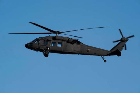 A U.S. Army Blackhawk helicopter flies near the Pentagon, Wednesday, Nov. 3, 2021, in Washingto ...