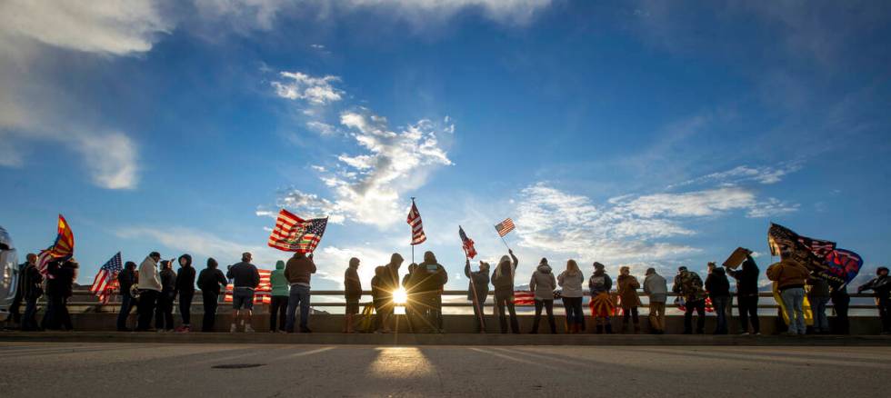 Supporters line an I-40 overpass in Arizona awaiting The People’s Convoy who departed Ad ...