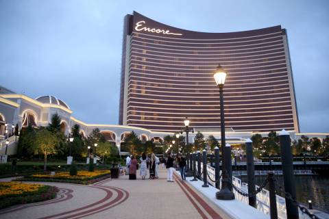 Guests take in the Mystic River during an invitation-only party at Encore Boston Harbor in June ...