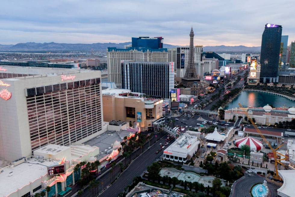 Aerial view looking south down the Las Vegas Strip at sunset on Monday, December 6, 2021. (Mich ...