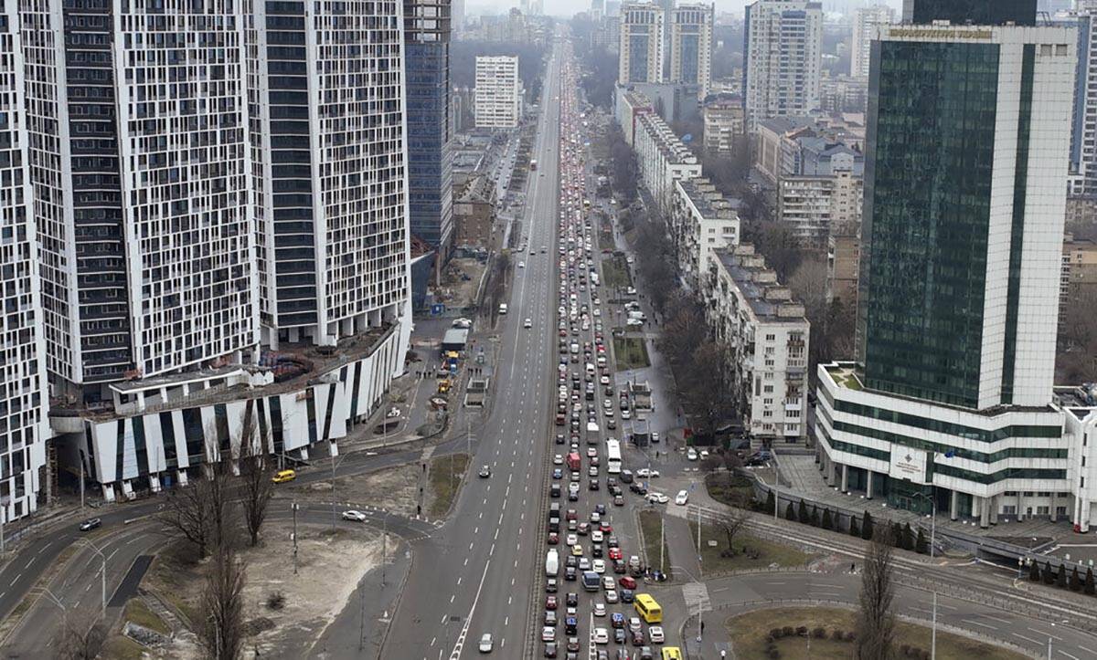 Traffic jams are seen as people leave the city of Kyiv, Ukraine, Thursday, Feb. 24, 2022. Russi ...