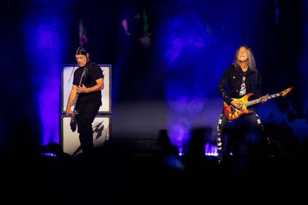 Robert Trujillo, left, and Kirk Hammett of Metallica perform in a music concert at Allegiant St ...