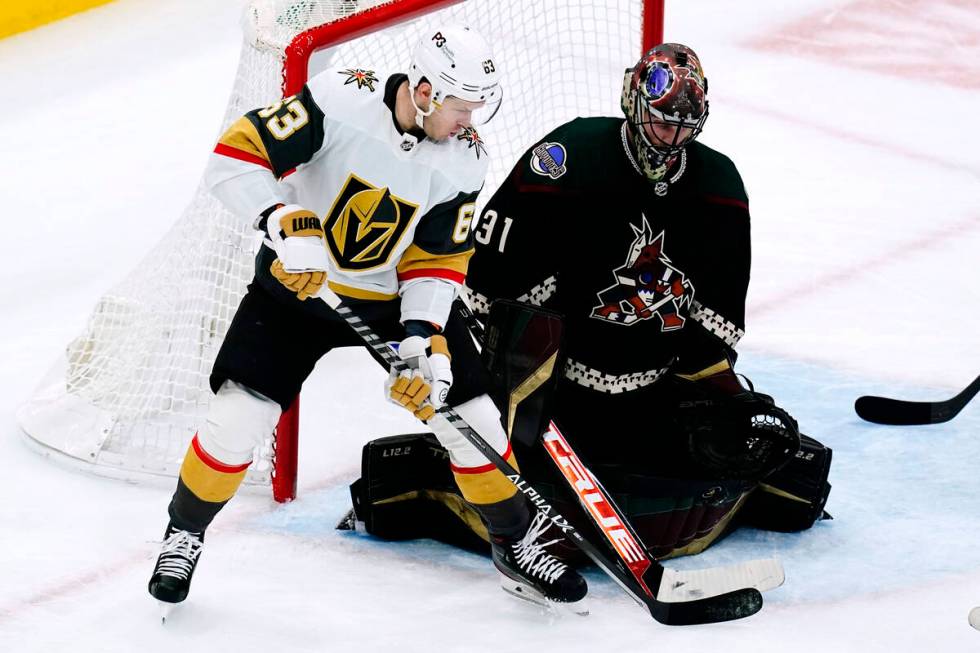 Arizona Coyotes goaltender Scott Wedgewood (31) makes a save on a deflection by Vegas Golden Kn ...