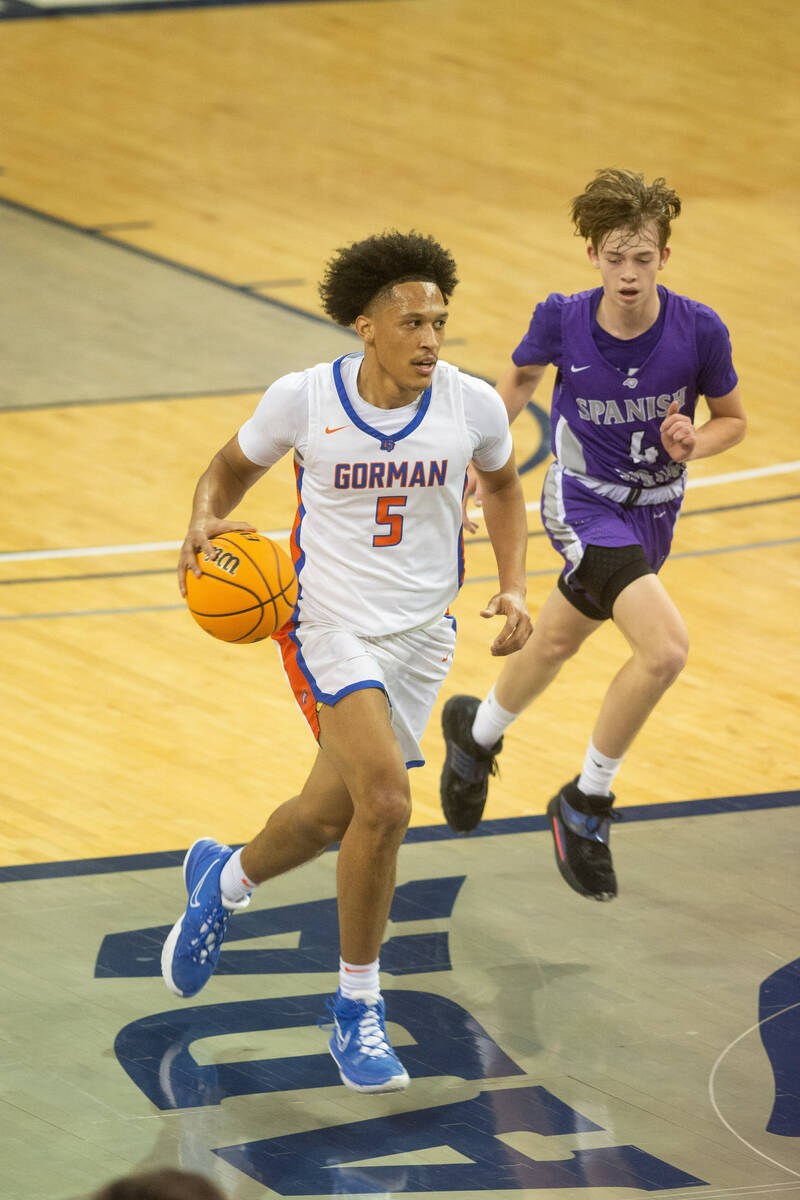 Bishop Gorman's Darrion Williams brings the ball up the court against Spanish Springs High Scho ...