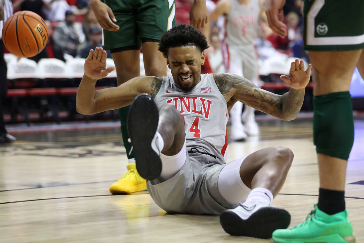 UNLV’s Royce Hamm Jr. (14) reacts after getting fouled in the first half of a men&#x2019 ...