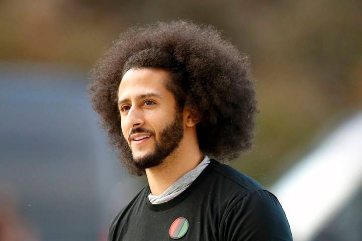 Colin Kaepernick arrives for a workout for NFL football scouts and media in Riverdale, Ga., in ...