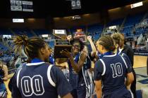 Centennial High School celebrates their win over Biship Manogue in the NIAA Class 5A girls bask ...