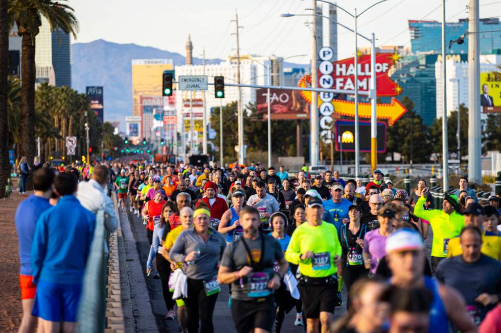 Participants compete during the Rock ‘n’ Roll Las Vegas half marathon and 10-kilo ...