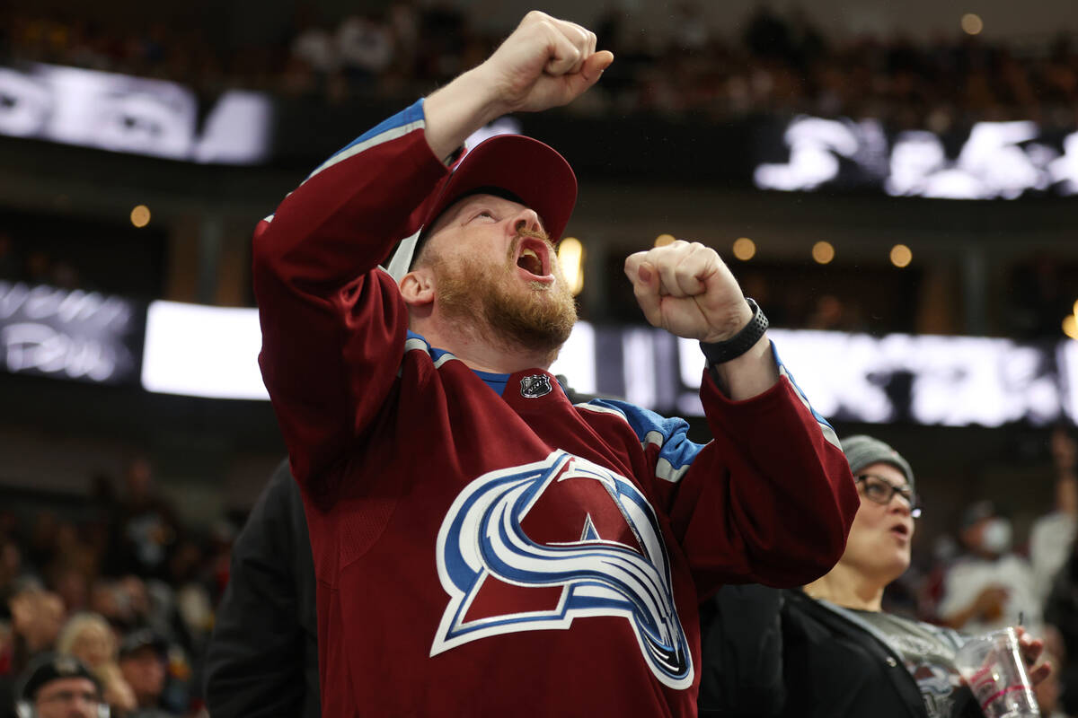 A fan celebrates a Colorado Avalanche score against the Vegas Golden Knights during the third p ...