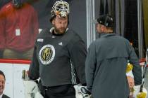 Vegas Golden Knights goaltender Robin Lehner (90, left) talks with head coach Peter DeBoer duri ...