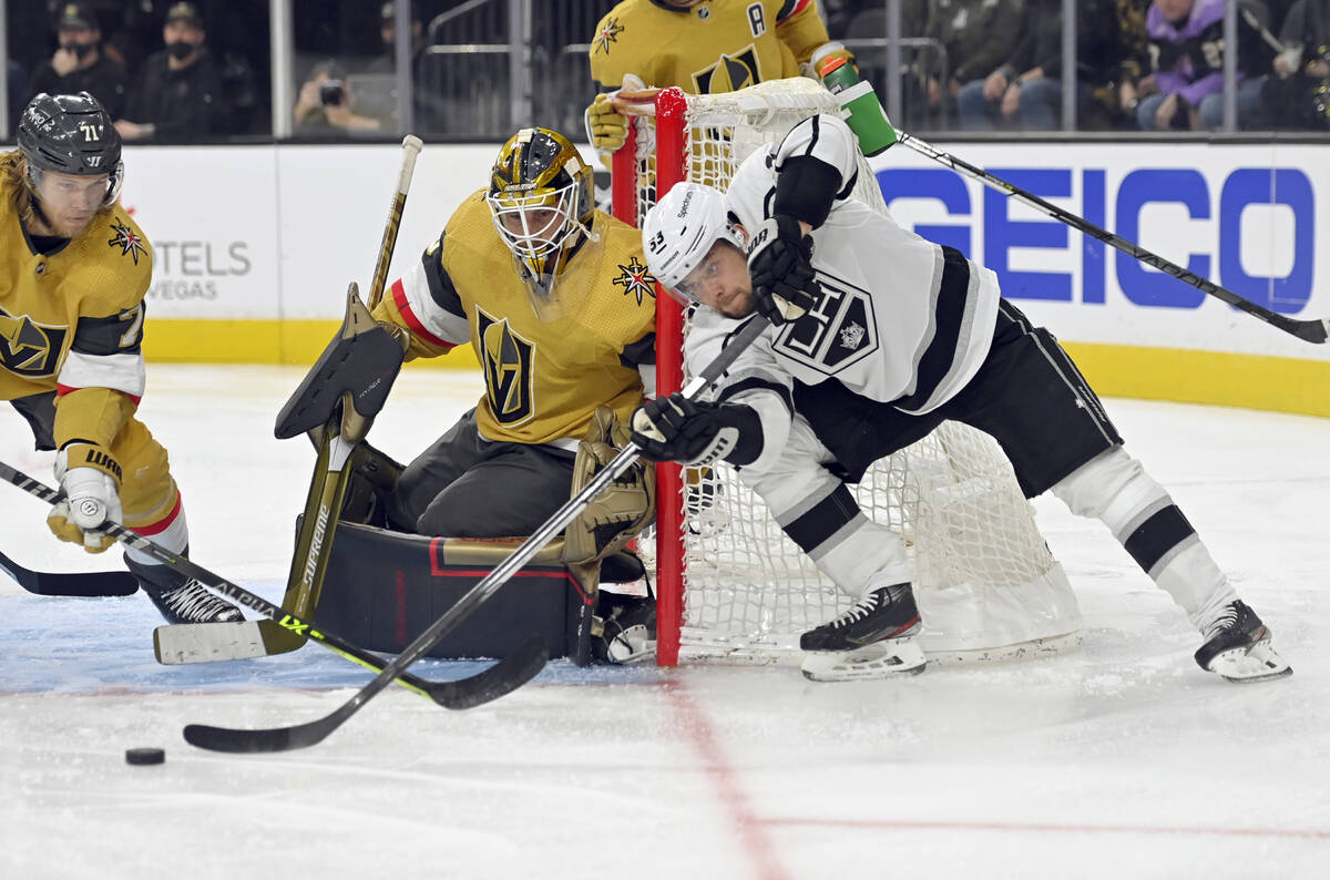 Los Angeles Kings left wing Viktor Arvidsson (33) tries for a shot on Vegas Golden Knights goal ...