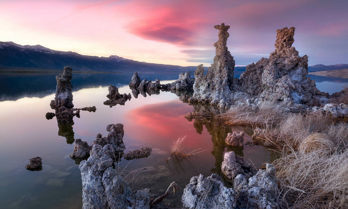 Sunset at Mono Lake highlights the tufa spires that lend the area its otherworldly demeanor. (G ...