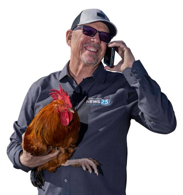 KPVM 25 co-owner Vern Van Winkle, even while holding a rooster, is never far from his phone out ...