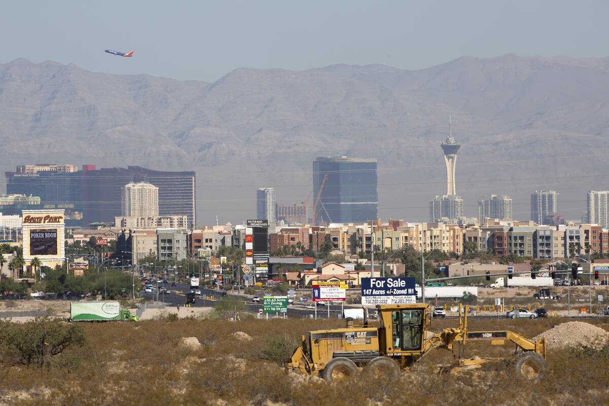 The Las Vegas Strip is in the background of the construction site of new apartment complex Ariv ...