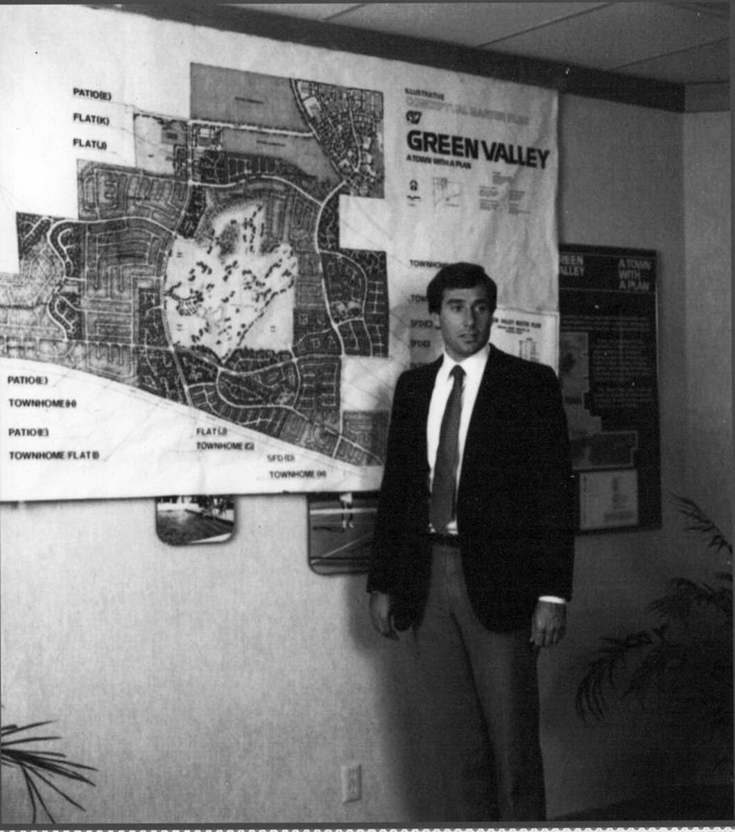 Developer Mark Fine stands in front of a map of Henderson's Green Valley community in the early ...