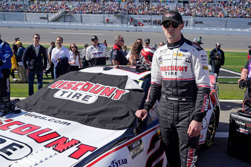 Austin Cindric by his car before the NASCAR Daytona 500 auto race at Daytona International Spee ...