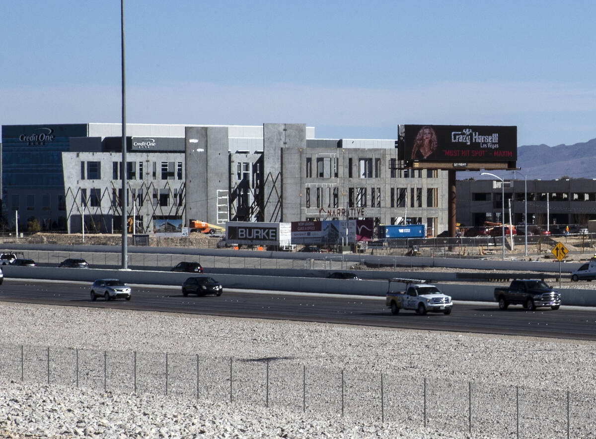Traffic on the 215 Beltway is flowing as the Narrative office building project is underway on M ...