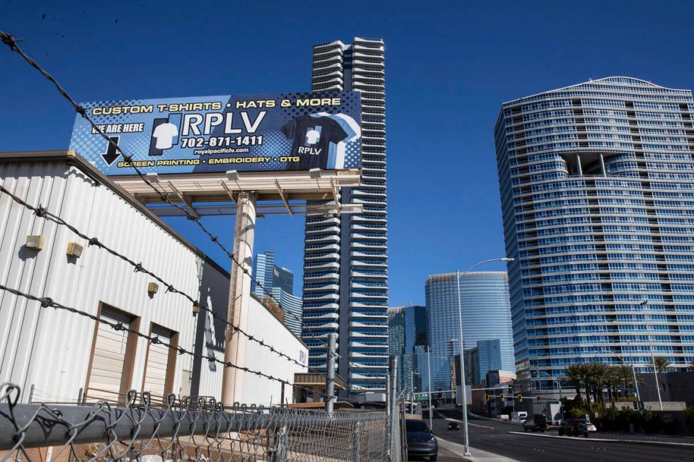 Royal Pacific of Las Vegas (RPLV), left, screen print/embroidery shop, is seen where developer ...