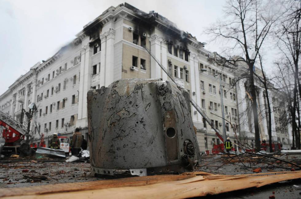 A rocket fragment lies on the ground next to a building of Ukrainian Security Service (SBU) aft ...