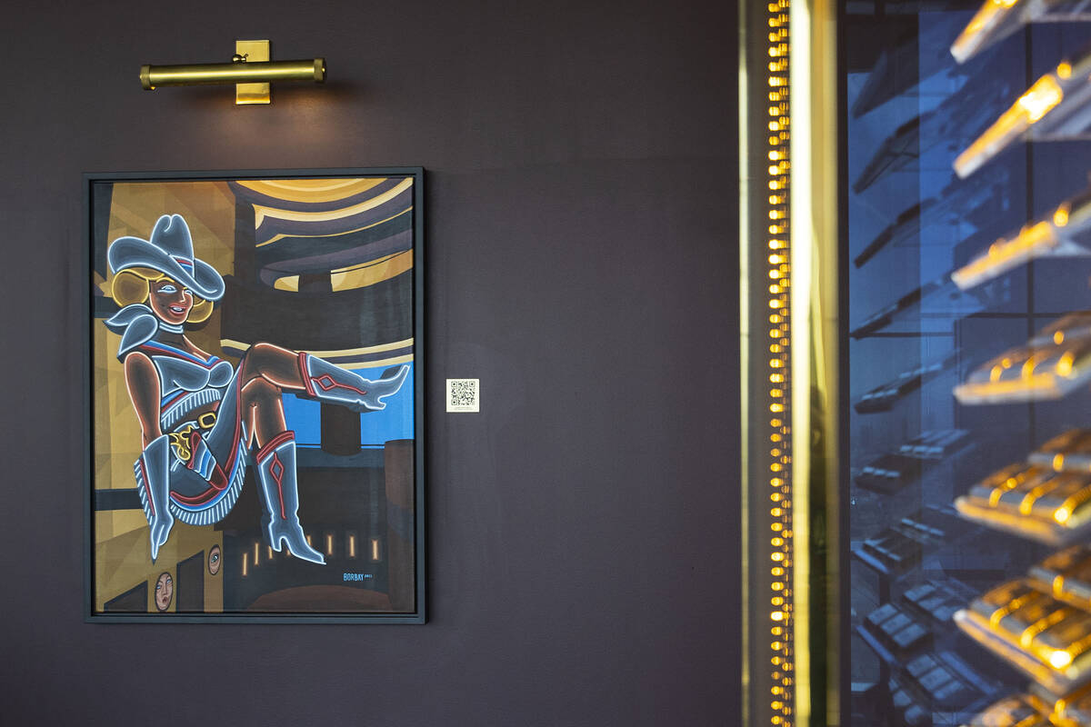 A painting of Vegas Vickie by artist Borbay is displayed at Legacy Club at Circa on Wednesday, ...