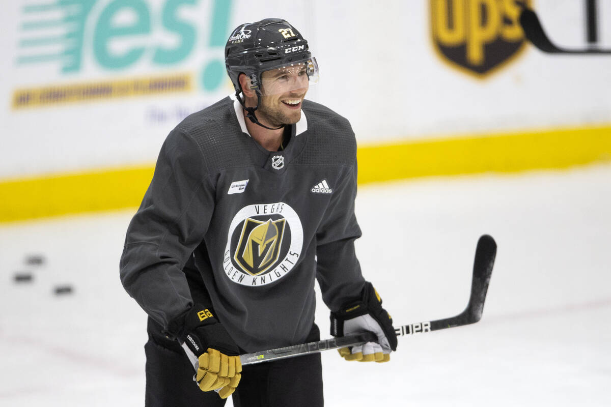 Golden Knights defenseman Shea Theodore (27) laughs with teammates during a NHL hockey training ...