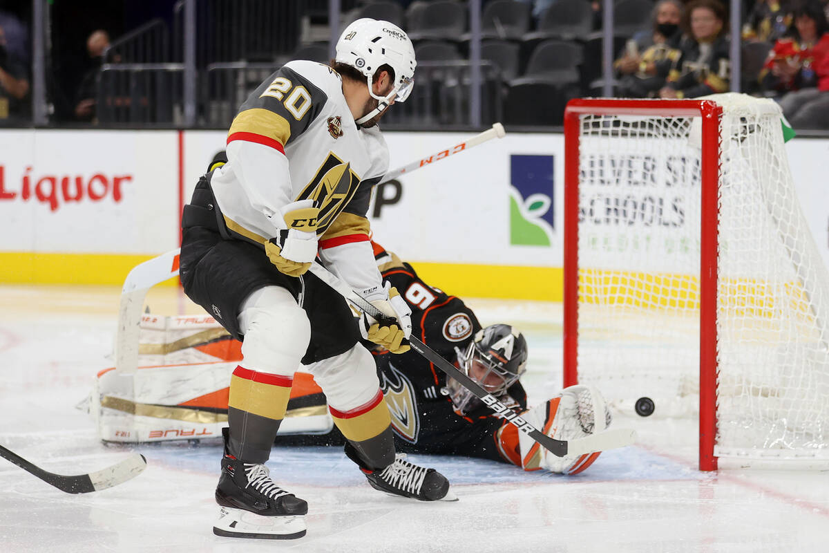 Vegas Golden Knights center Chandler Stephenson (20) scores a goal against Anaheim Ducks goalte ...