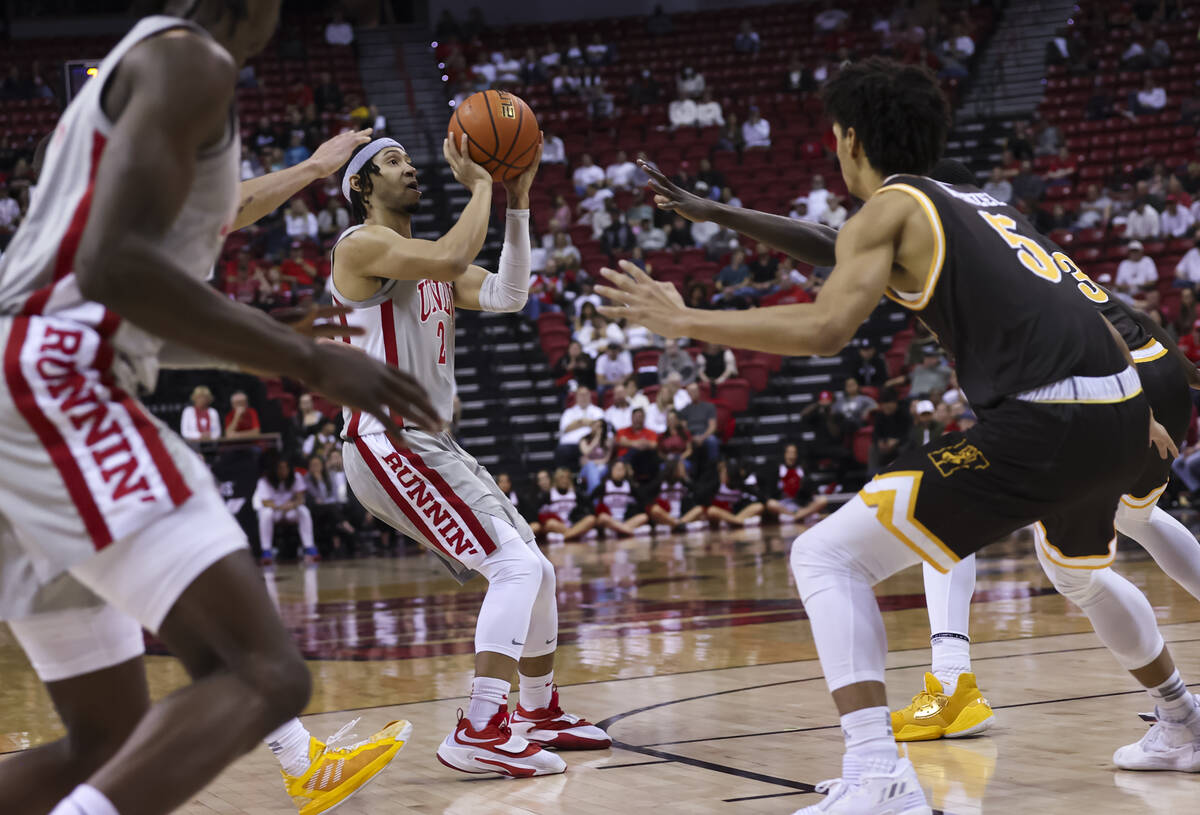 UNLV Rebels guard Justin Webster (2) shoots against the Wyoming Cowboys during the second half ...