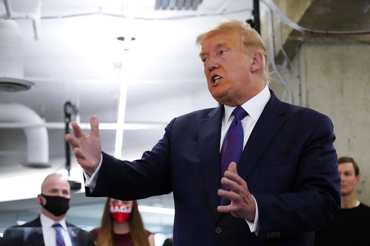 FILE - President Donald Trump speaks at the Trump campaign headquarters on Election Day, Nov. 3 ...