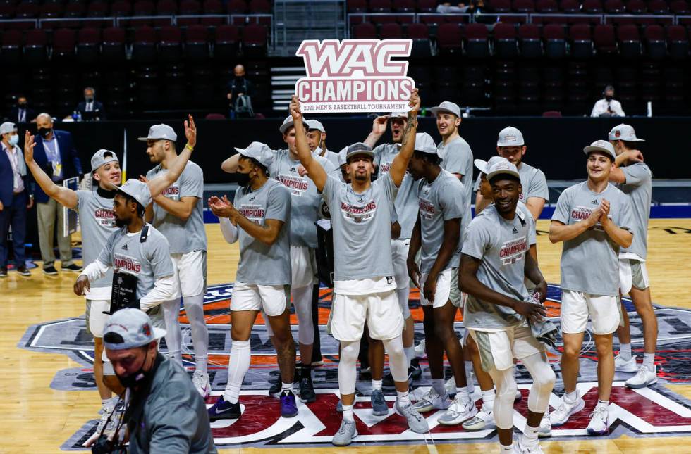 Grand Canyon players celebrate after defeating New Mexico State 74-56 in an NCAA college basket ...