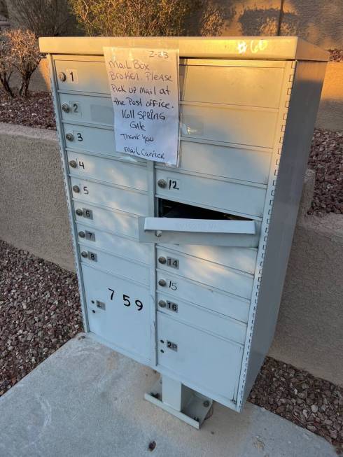 A sign, dated Feb. 23, is attached to a broken cluster mailbox on Winter Teal Avenue in Summerl ...