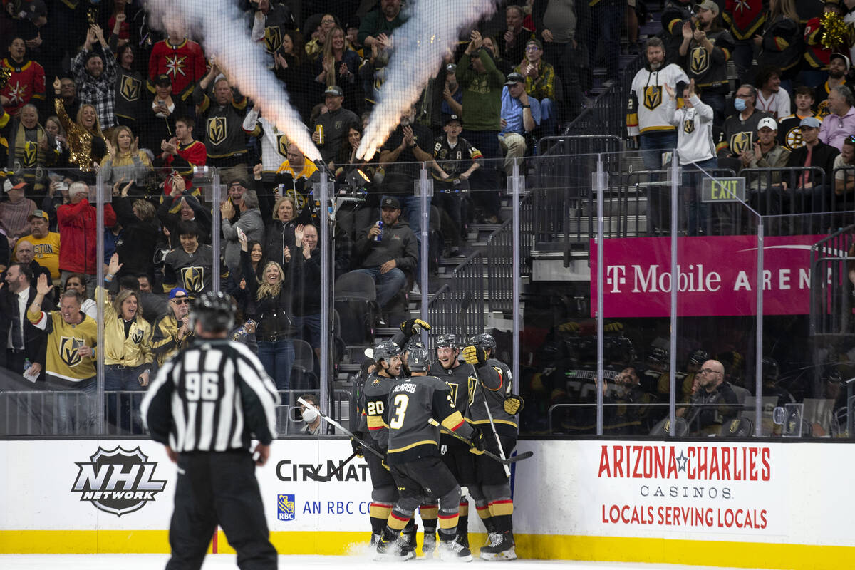 The Golden Knights celebrate after Golden Knights center Jack Eichel (9) scored a goal on the B ...