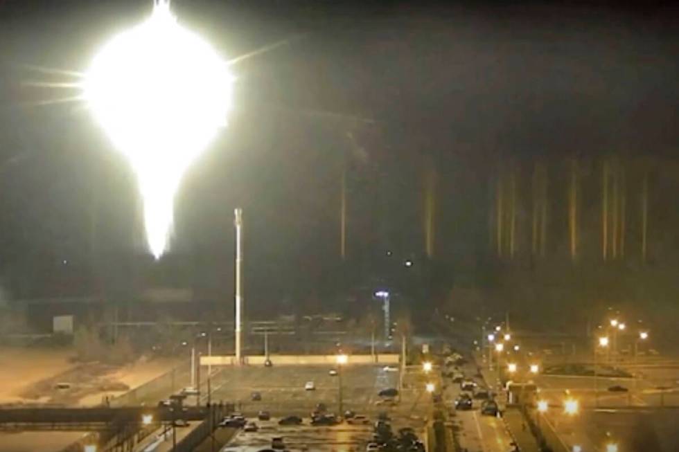 This image made from a video released by Zaporizhzhia nuclear power plant shows bright flaring ...