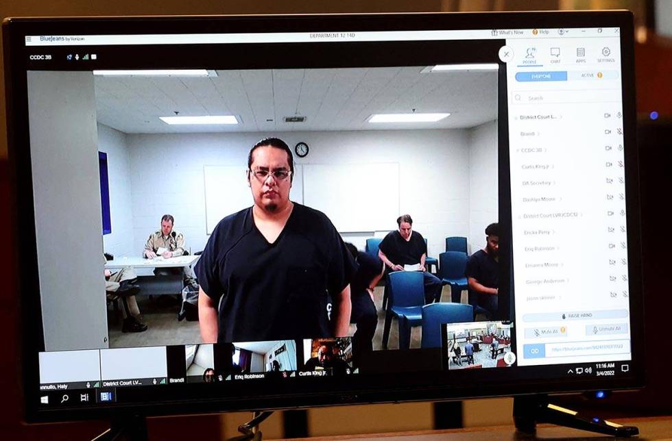 Brian Dewakuku appears via video in court at the Regional Justice Center in Las Vegas Friday, M ...