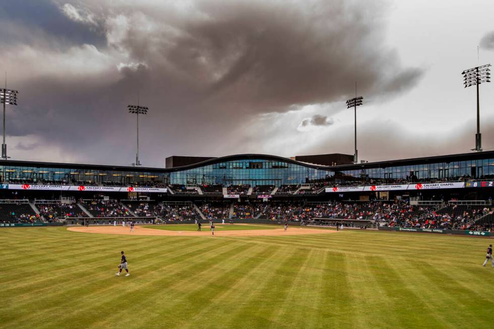 In this March 1, 2020, file photo, storm clouds begin to roll in as the Cleveland Indians and O ...