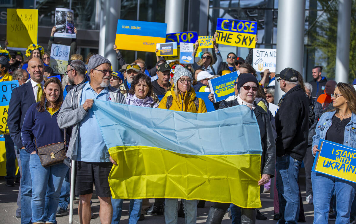 People stand united during a Rally for Ukraine at City Hall on Saturday, March, 5, 2022. (L.E. ...