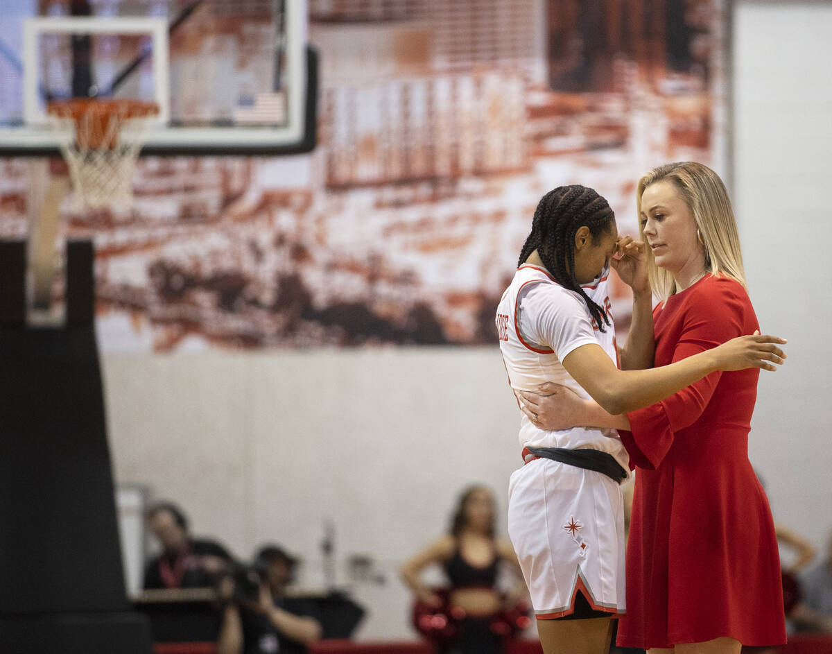 UNLV Lady Rebels head coach Lindy La Rocque, right, consoles UNLV Lady Rebels guard Justice Eth ...