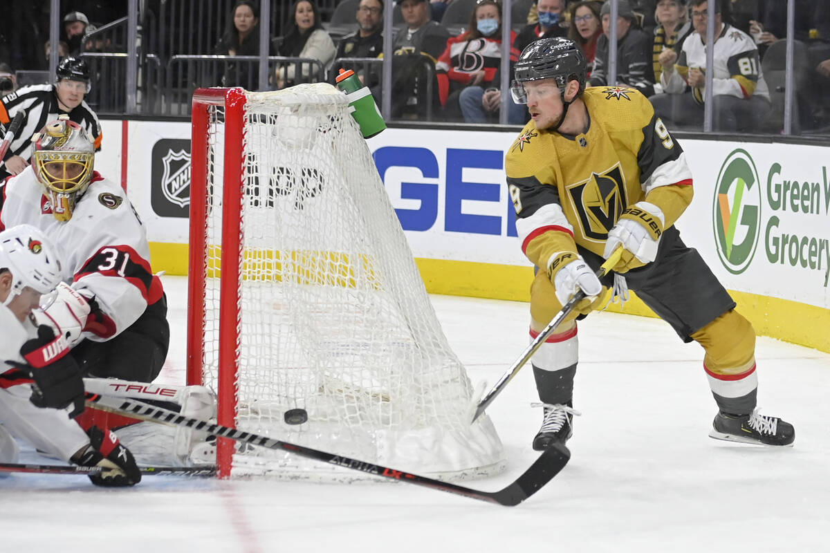 Vegas Golden Knights center Jack Eichel (9) skates around the net with the puck against the Ott ...