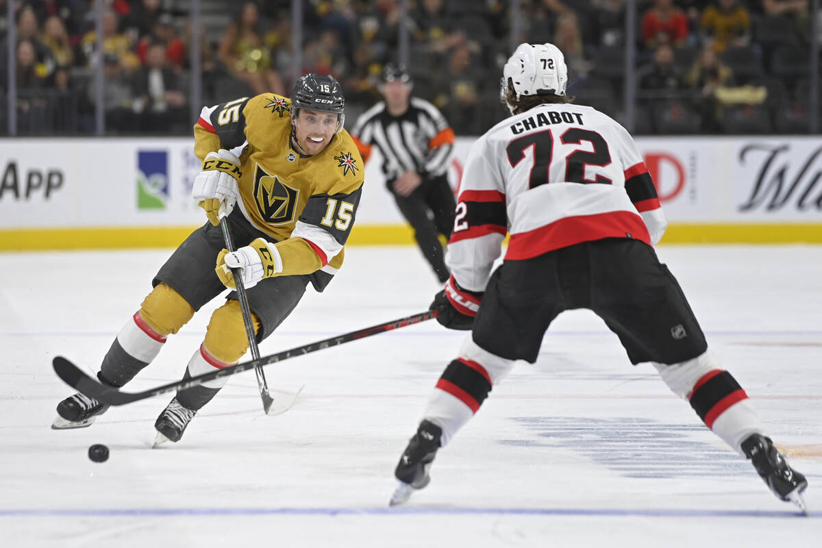 Vegas Golden Knights center Jake Leschyshyn (15) skates against Ottawa Senators defenseman Thom ...