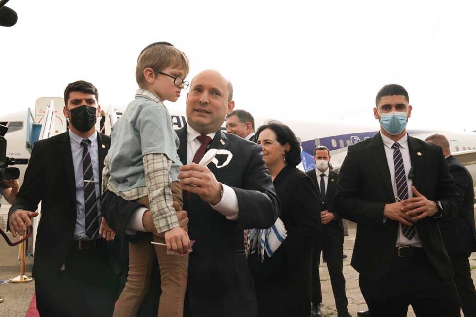 Israeli Prime Minister Naftali Bennett welcomes a group of orphans from the Alumim orphanage in ...