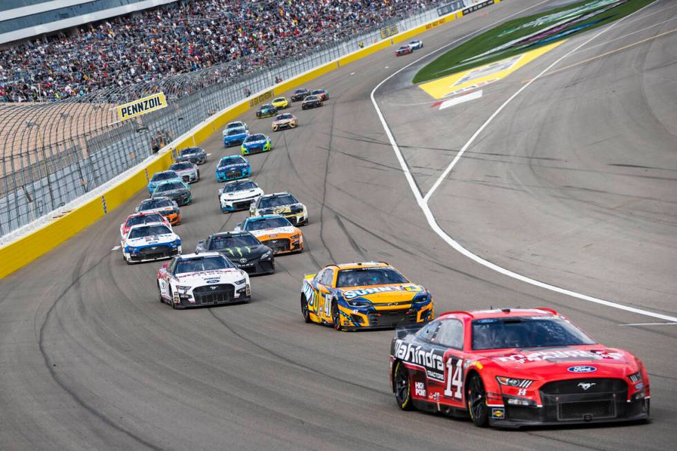 NASCAR Cup Series driver Chase Briscoe (14) leads the pack during the Pennzoil 400 NASCAR Cup S ...